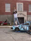  [Image: Person about to hit a car with a sledgehammer] 